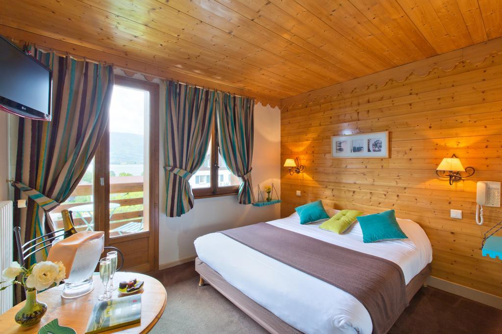 Готель Logis La Charpenterie Таллуар Номер фото